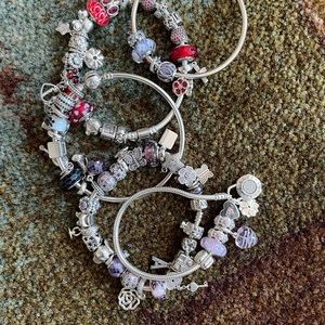 Five (5) pandora bracelets as is.